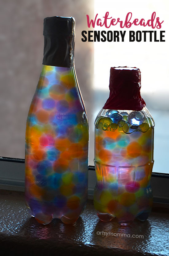 DIY Sensory Bottle with Water Beads - Looks colorful in the window as a suncatcher!