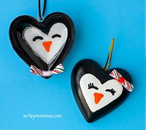Turn Clear Plastic Heart Ornaments Into Adorable Penguins To Hang On The Christmas Tree
