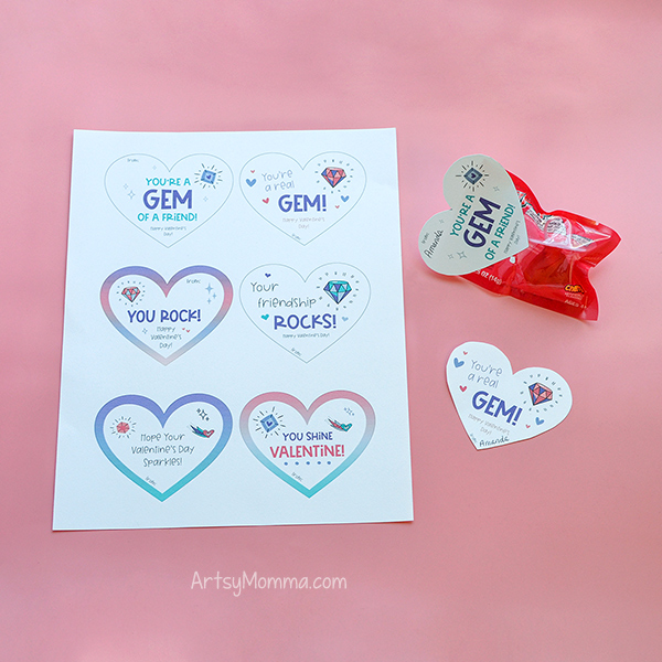 6 Printable Heart Tags with GEM/ROCK puns and image of one added to the top of a Ring Pop Valentine.